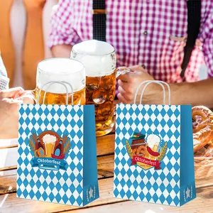 Oktoberfest paper gift bags with blue diamond pattern on a festive wooden table