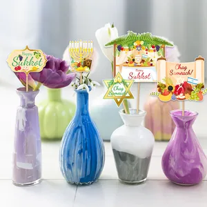 Colorful Sukkot table flags and Happy Sukkot decorations in five ceramic vases