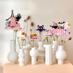 Set decorazioni Halloween rosa con fantasmi, pipistrelli e scritte boo in vasi bianchi