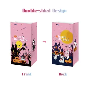 Detail of pink Halloween paper gift bags showing double-sided castle and ghost designs