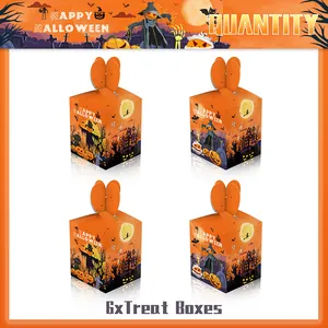 Detalle de cajas de dulces naranjas para Halloween con ilustraciones de calabaza y castillo