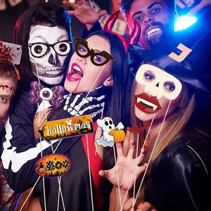 Halloween photo booth props set featuring pumpkin, spider, and black cat theme eyewear