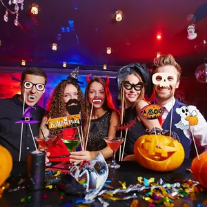 Halloween party photo booth props set with pumpkin bat and skull designs for festive photos