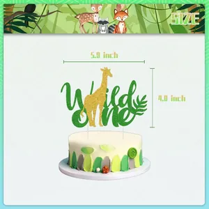 Wild One cake topper with gold glitter giraffe and green glitter text for forest theme party