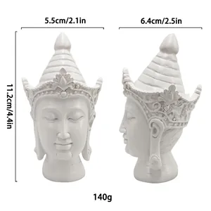 Southeast Asian white resin Buddha head statue with dimensions and weight details