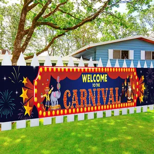 Large carnival circus welcome banner with animals on outdoor yard fence background