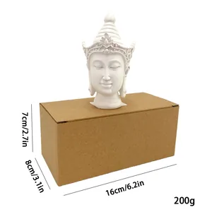 Detailed view of Buddha head statue size dimensions 16x8x7cm in retail packaging