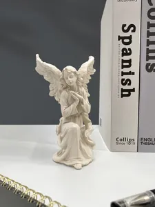 Detailed resin angel girl sculpture in prayer pose with wings for home decor