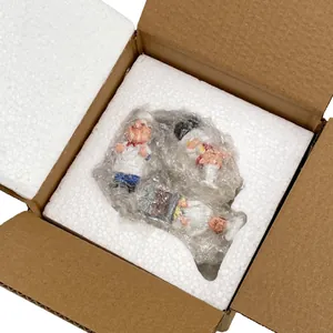 Three-piece chef figurine set in protective foam and bubble wrap packaging box