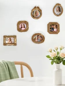 Set of six vintage gold baroque picture frames with embossed textures for jewelry photography