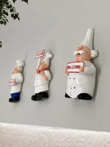 Détail de trois magnets de cuisine 3D en résine avec panneaux Welcome et Foodie décoratifs