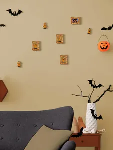 Halloween wall stickers featuring vintage frames with pumpkins and black bat silhouettes