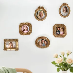Set of 6 vintage gold European picture frames with floral embossed details for wall decor
