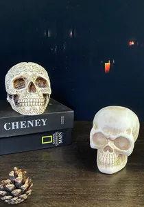 Detailed view of skull resin decor with smooth and intricate Celtic textured finishes