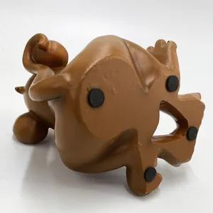Detail of animal phone stand base with four black non-slip pads for desktop stability