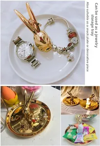 Detail of Nordic golden rabbit jewelry tray used for organizing rings and bracelets