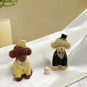 Detail of creative resin poodle fridge magnets in yellow and black formal suits