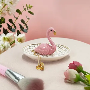 Pink flamingo ceramic jewelry tray with golden grid patterns for ring and necklace storage
