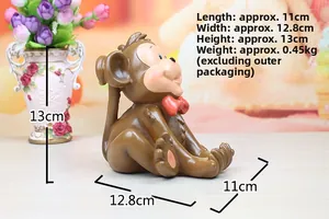 Detailed dimensions of the cute monkey resin phone holder shown on a wooden surface