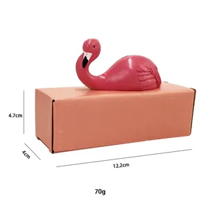 Pink flamingo decorative ornament size details with dimensions 12.2cm x 4cm x 4.7cm and weight