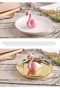 Detailed view of flamingo ceramic jewelry dish with gold-painted beak and relief glaze finish