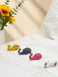 Set of four cute animal resin figurines including flamingo and giraffe for desk decor