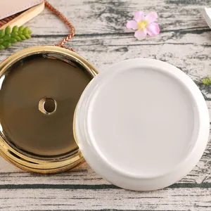 Nordic gold bunny ceramic jewelry tray with white base and elegant metal chain details