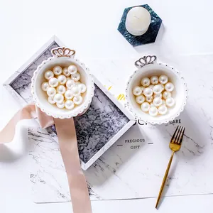 Nordic white ceramic jewelry bowl with gold rim and crown handle decor