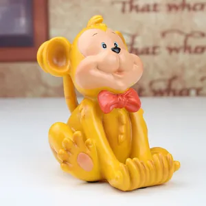 Creative yellow resin monkey phone holder with red bowtie for desk decoration