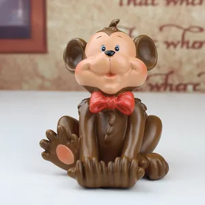 Creative resin monkey phone stand holder figurine for desk decoration and display