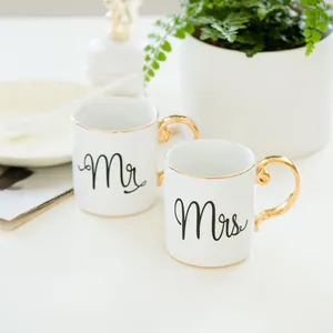 Elegant Mr and Mrs ceramic mug set with gold handles for couples and office coffee tea