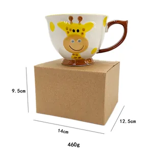 Detail of ceramic deer mug with hand-painted 3D relief and brown handle in craft box