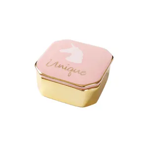 Rosa und goldene achteckige Schmuckdose aus Keramik mit Einhorn-Design und Aufschrift