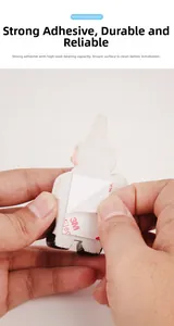 Detail of 3M adhesive backing on cartoon chef toothbrush holder for wall mounting