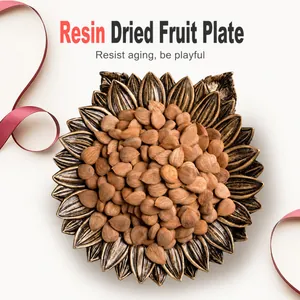 Zonnebloemvormige hars tray in brons goud voor noten en woondecoratie