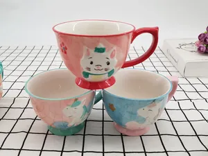 Ceramic mugs set featuring cute hand-painted animals with sturdy handles and high bases