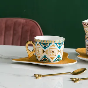 Service à café en céramique style européen avec anse aile d'ange et soucoupe jaune