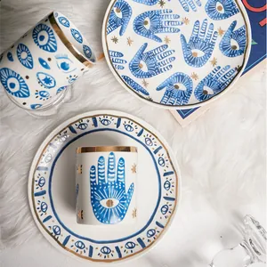 Stoviglie in Ceramica Malocchio Mano di Fatima Blu Bianco Oro Placcato Piatto Tazza Mug Barattolo Arredo Casa Regalo Lusso