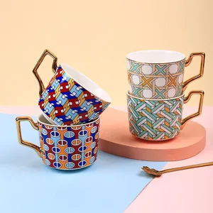 British style ceramic coffee cup set with colorful geometric patterns and gold handle