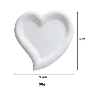 Detailed dimensions of heart-shaped white jewelry tray showing height 10cm and width 9.5cm