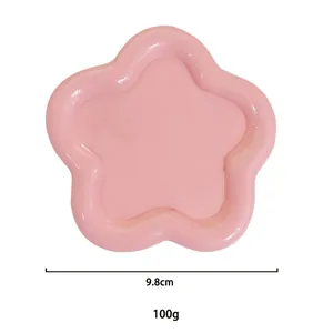 Detail view of 9.8cm pink floral resin jewelry plate for earrings and necklaces