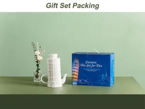 Detailed view of the Leaning Tower of Pisa ceramic tea set in a blue gift box packaging