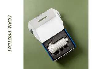 Detailed view of white ceramic teapot with relief pattern in secure foam packaging box