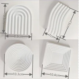 Detailed view of four white textured resin jewelry display trays with dimensions