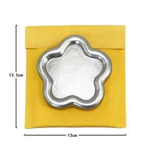 Silver petal shaped metal jewelry tray with handmade hammer texture and size markings