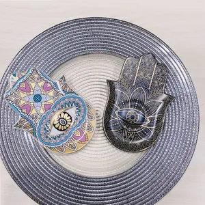 Keramische Hamsa hand sieradenschaal met kleurrijke mandala en blauw oog patroon