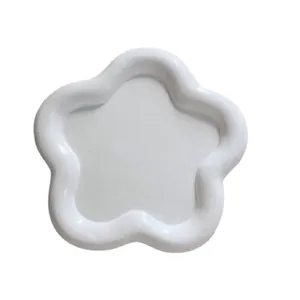 Irregular white resin jewelry tray with wavy floral edges for photography props