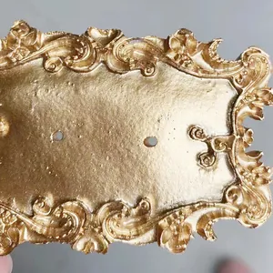 Vintage gold baroque resin display stand with ornate relief patterns for jewelry