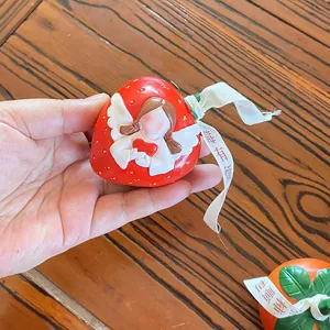 Creative strawberry resin ornament with angel relief and lucky red ribbon decoration