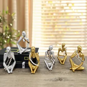 Golden abstract thinker resin statue set and jewelry display stand for office desk